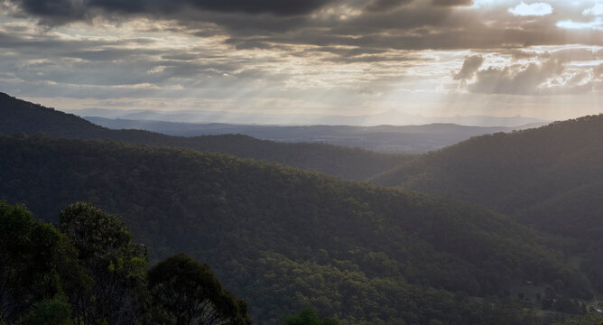 Sunrays shining down on hills at Mount Tamborine - Gold Coast