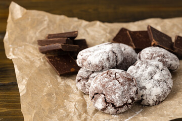 Chocolate cookies powdered with sugar close up