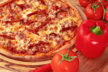 Freshly baked pizza on table close up
