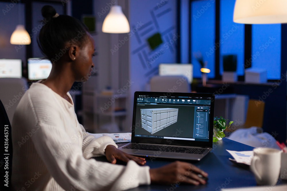 Poster black freelancer architect working in 3d software to elaborate container design sitting at desk in b