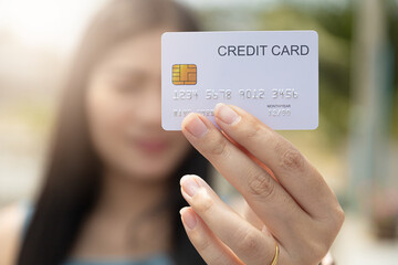 Closeup hand takes of credit card for financial transactions