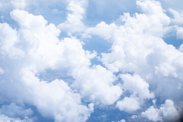 A bird's-eye view of the sky and many white clouds