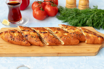 Close up of Turkish Pide bread on wooden table