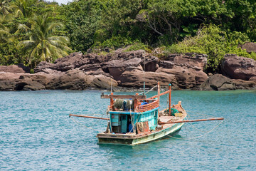 Naklejka na ściany i meble Fishing boat on the island of Phu Quoc, Vietnam, Asia