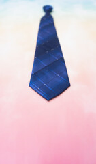 Vertical scene of blue tie gift for father or dad in father's day with colorful background