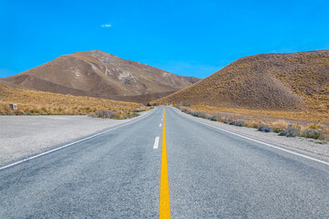 Road to Somewhere. A New Zealand road disappearing into the distance South Island mountain range