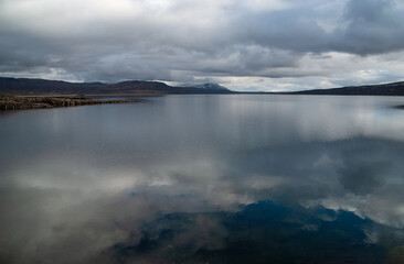 Clouds over the lake, Sylsjøen or Nedalssjøen, Norway, Sweden, with clouds reflected in the water.