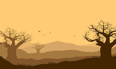 Fototapeta na wymiar The panorama of the mountains at dusk is really beautiful with the silhouettes of the dry trees around it. Vector illustration
