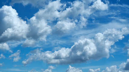 Naklejka na ściany i meble Clouds on blue sky background on Milano city. Cumulonimbus
