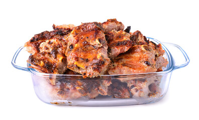 meat fried on coals in a glass cup isolated on a white background.pork ribs.selective focus.