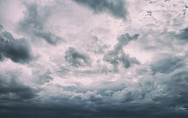 Fototapeta na wymiar The beutiful dark rainy clouds in the sky