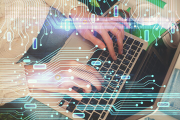 Double exposure of woman hands working on computer and data theme hologram drawing. Tech concept.
