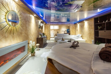 Interior of a romantic hotel bedroom with round bed