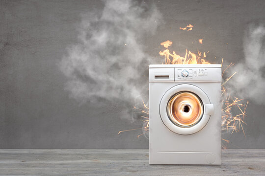 Broken Washing Machine With Smoke And Fire