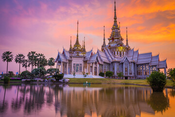 Fototapeta na wymiar Wat Non Kum is a beautiful and famous temple located in Sikhio District, Nakhon Ratchasima Province at sunset time