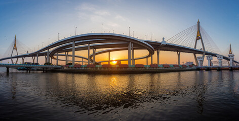 Panorama landscape of Bhumibol Bridge is a large and modern-looking bridge that is an important landmark of Bangkok in sunset time