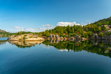 Fototapeta na wymiar Norway, fjord sea green landscape with reflection, Lysefjord