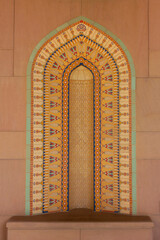 Arabian style background in yellow colors. Oriental eastern ornament in Muscat, Oman. Sultan Qaboos Grand Mosque