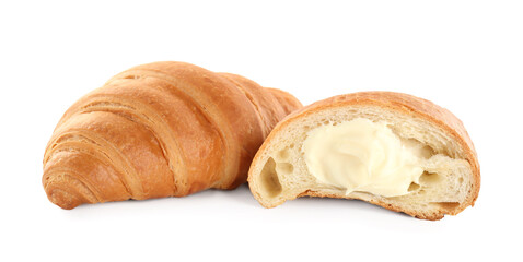 Delicious croissants with cream on white background