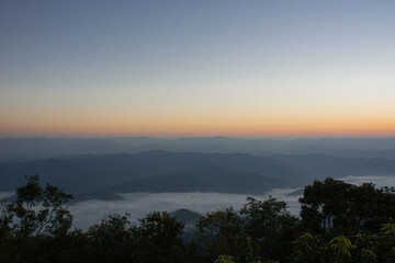 Dawn of Sea Fog on the top of the Sierra Early morning at Doi Samer Dao, Nan, thailand