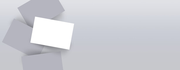 Realistic mockup branding business cards template with shadow on a grey background. Flat lay, top view.