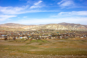 Obraz premium A small village among the beautiful Gobustan mountains. Azerbaijan.