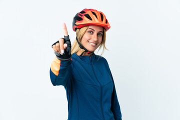Young blonde Uruguayan cyclist woman isolated on background showing and lifting a finger