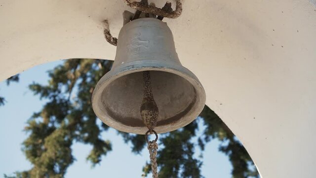 Close up, vintage church bell. Low angle shot