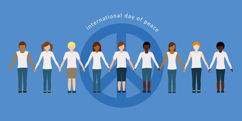 children of different skin color hold each other's hands on international day of peace