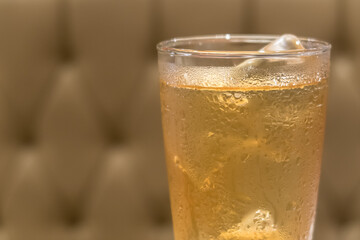 Glass of ice tea. It is an aromatic beverage.