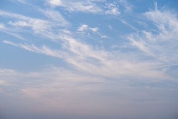 Naklejka na ściany i meble White clouds against blue sky in horizontal background and copy space