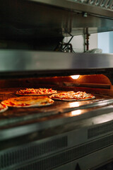 Pizza Into The Oven