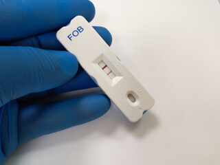 Fecal occult blood test (FOBT) positive by using rapid test cassette, colorectal cancer diagnosis