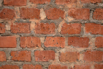 Obraz premium Abstract background of an old red brick wall