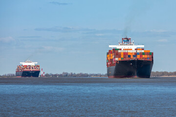 Two very large container ships on Elbe river