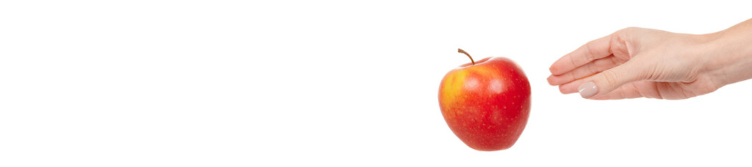 Hand with fresh red apple isolated on white background.