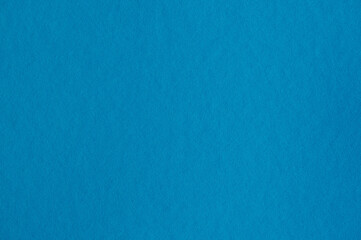 Fototapeta na wymiar Closeup of seamless blue paper texture