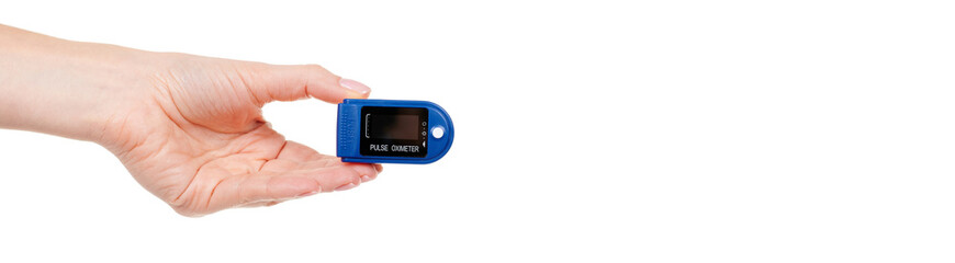 Hand with medical oximeter isolated on white background.