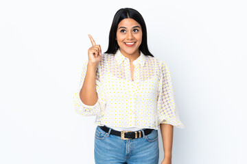 Young latin woman woman isolated on white background intending to realizes the solution while lifting a finger up