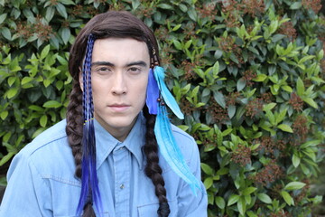 Young Native American man with traditional look