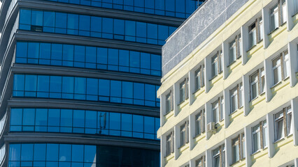 Fragment of a modern building. Modern architecture design. Structural glass facade of modern office building. Abstract architecture fragment. Architecture concept.