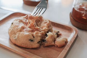 Chocolate cookies with chocolate chips and melted marshmallow in the center.