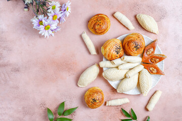 Fototapeta na wymiar Traditional Azerbaijan holiday Novruz sweets,shekerbura,qogal,paxlava,mutaki.
