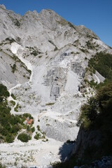 Fototapeta na wymiar Marble quarries in the Apuan Alps between Monte Pisanino and Monte Cavallo.On the Garfagnana side of the Apuan Alps there are numerous white marble quarries. Alpi Apuane, Garfagnana, Italy. 