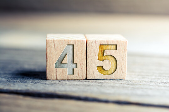 Number 45 Formed By Wooden Blocks On A Board