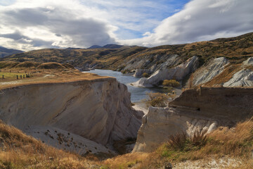 The Blue Lake, a man-made lake created by gold mining operations at the town of St. Bathans, New Zealand. It is now a scenic attraction