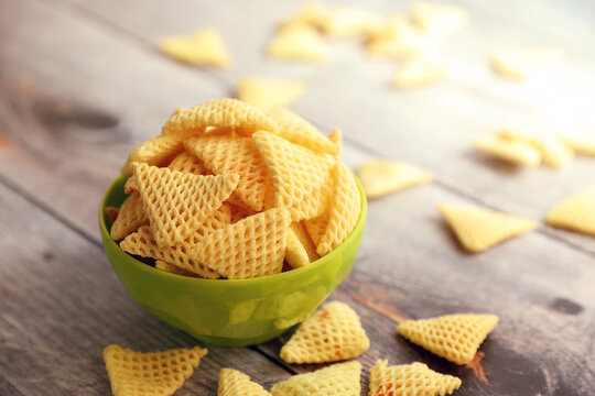 crunchy Indian homemade triangle shape Fryums Papad or chips	
