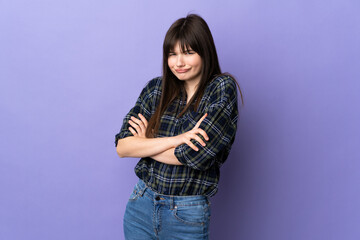 Young Ukrainian woman isolated on purple background making doubts gesture while lifting the shoulders