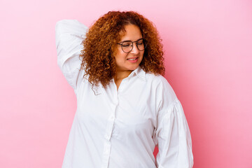 Young latin curvy woman isolated on pink background suffering neck pain due to sedentary lifestyle.