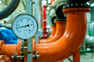 Pressure gauge water condenser pump and  HVAC  air conditioning system and pipping line of industrial construction at Chiller plant  room system in the factory. - obrazy, fototapety, plakaty